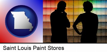 a couple looking at paint samples at a paint store in Saint Louis, MO