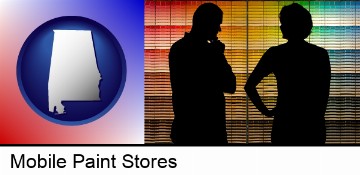 a couple looking at paint samples at a paint store in Mobile, AL